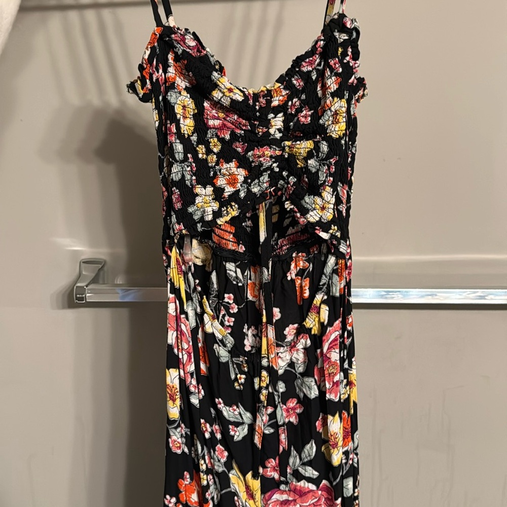 Black and floral open belly jumpsuit size xs